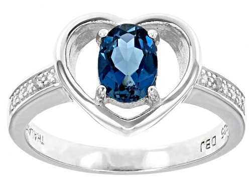 Photo of 0.90ct Oval London Blue Topaz With .01ctw Diamond Accent Rhodium Over Sterling Silver Ring - Size 10
