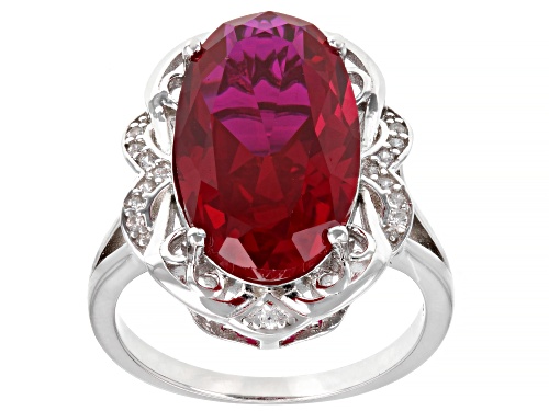 Photo of 7.28ct Oval Lab Created Ruby With 0.07ctw Round White Zircon Rhodium Over Sterling Silver Ring - Size 7