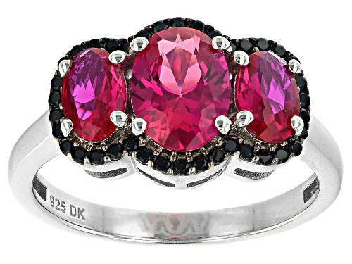 Photo of 1.92ctw Oval Lab Created Ruby With 0.20ctw Round Black Spinel Rhodium Over Sterling Silver Ring - Size 9