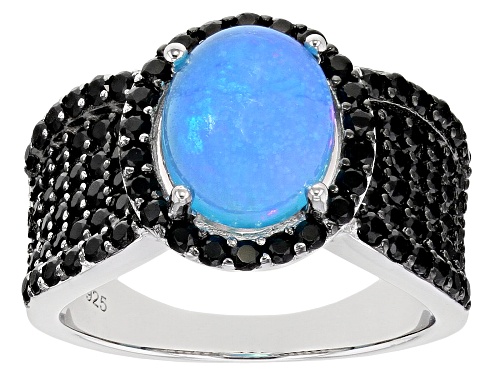 Photo of 1.70ct Oval Paraiba Blue Opal and 1.18ctw Round Black Spinel Rhodium Over Sterling Silver Ring - Size 8