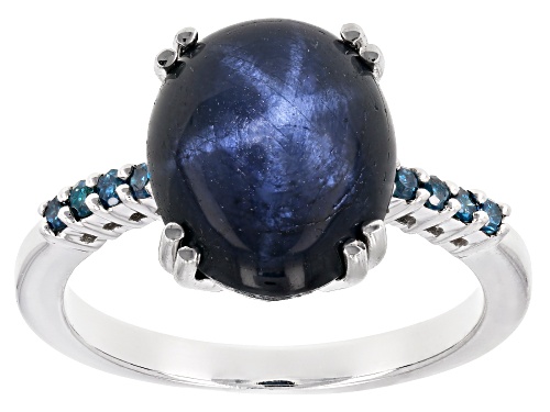 6.97ct oval blue star sapphire with .10ctw blue diamond rhodium over sterling silver ring - Size 8