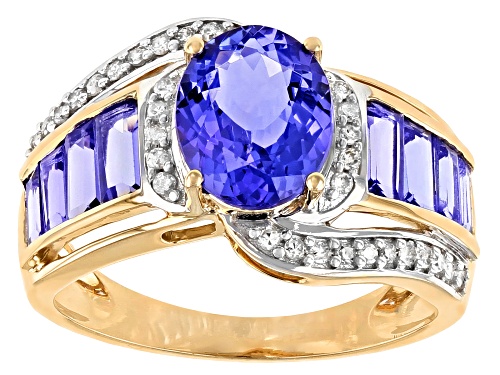 Photo of 2.62ctw Oval And Baguette Tanzanite With 0.11ctw Round White Diamond 10K Yellow Gold Ring - Size 7