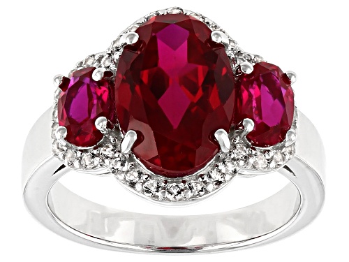 4.76ctw Oval Lab Created Ruby With .38ctw White Topaz Rhodium Over Sterling Silver Ring - Size 9
