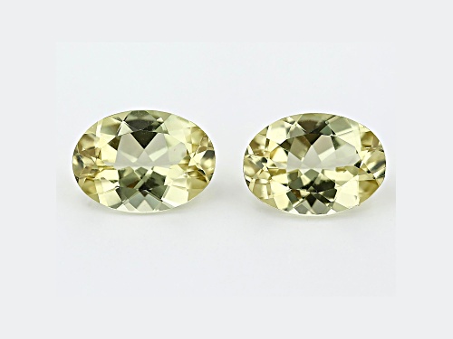 MATCH PAIR CANARY APATITE OVAL 14X10 WITH MINIMUN OF 11.00 CTW.