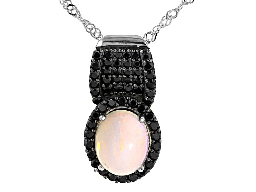 Photo of 1.50ctw Oval Ethiopian Opal With 0.39ctw Black Spinel Rhodium Over Silver Pendant With Chain
