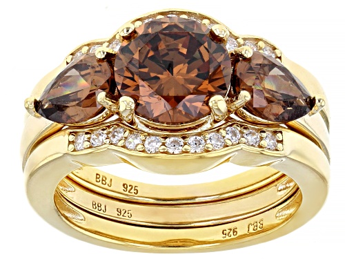 Photo of Bella Luce ® 6.39ctw Mocha And White Diamond Simulants Eterno™ Yellow Ring With Bands (3.68ctw DEW) - Size 7