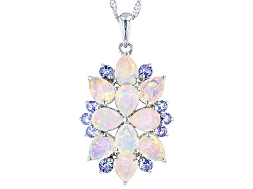 3.57ctw Pear Shape Ethiopian Opal With .74ctw Round Tanzanite Rhodium Over Silver Pendant/Chain