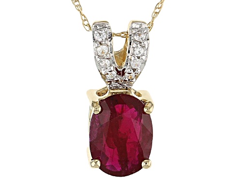 1.36ct Oval Mozambique Ruby With .06ctw Round White Zircon 14k Gold Pendant With Chain.