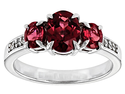 Photo of 2.34ctw Oval Raspberry Color Rhodolite With 0.05ctw Round White Zircon Rhodium Over Silver Ring - Size 8