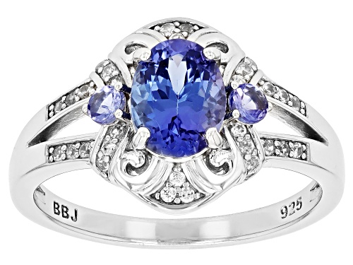 1.06ct Oval And 0.12ctw Round Tanzanite With 0.17ctw White Zircon Rhodium Over Silver Ring - Size 9