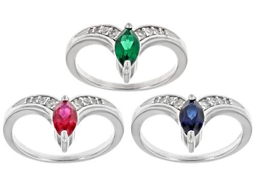 .48ct Lab Emerald, .55ct Lab ruby, .84ctw Lab Blue & Lab White Sapphire Rhodium Over Silver Ring Set - Size 8