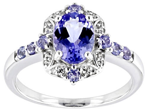 1.10ct Oval And 0.20ctw Round Tanzanite With .06ctw White Zircon Rhodium Over Silver Ring - Size 9