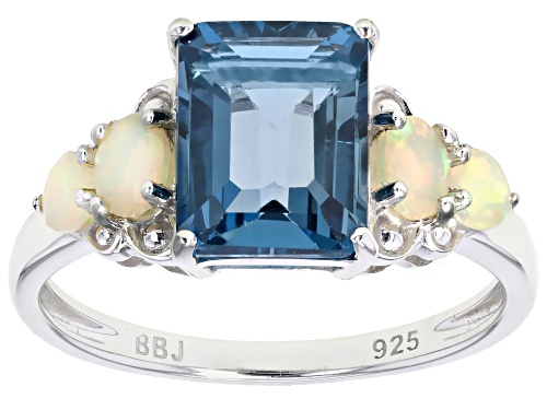 Photo of 2.51ct London Blue Topaz With 0.31ctw Ethiopian Opal Rhodium Over Sterling Silver Ring - Size 9