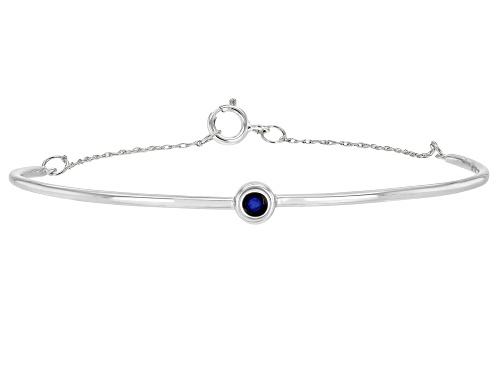 Photo of .10ct Round Blue Sapphire Solitaire Rhodium Over 10k White Gold Bracelet - Size 6