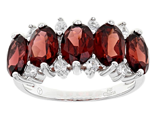 4.90ctw Oval Red Garnet With .45ctw Round White Zircon Rhodium Over Sterling Silver Ring - Size 7