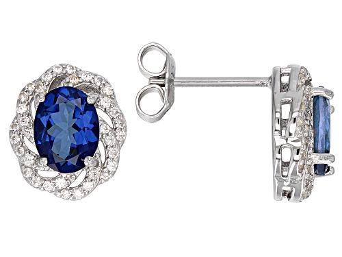 2.30CTW OVAL BLUE DANBURITE WITH .50CTW ROUND WHITE ZIRCON RHODIUM OVER SILVER STUD EARRINGS
