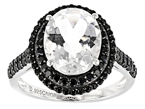 3.00CTW OVAL GOSHENITE WITH .78CTW ROUND BLACK SPINEL RHODIUM OVER SILVER RING - Size 8