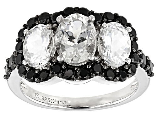2.60CTW OVAL GOSHENITE WITH 1.37CTW ROUND BLACK SPINEL RHODIUM OVER SILVER 3-STONE RING - Size 8