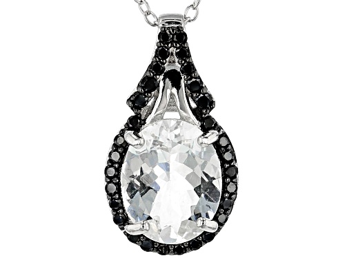 2.90CT OVAL GOSHENITE WITH .28CTW ROUND BLACK SPINEL RHODIUM OVER SILVER PENDANT WITH CHAIN