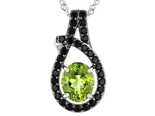 3.15ct Oval Peridot With .95ctw Round Black Spinel Rhodium Over Silver Pendant With Chain