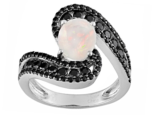 1.00ct Oval Ethiopian Opal And 1.75ctw Round Black Spinel Rhodium Over Sterling Silver Ring - Size 7