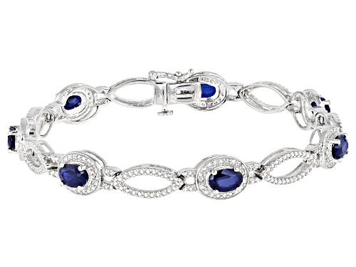 Photo of 4.00ctw Lab Created Blue Sapphire With 0.01ctw Diamond Accent Rhodium Over Silver Bracelet - Size 7