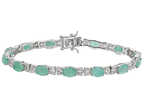 Photo of 6.50ctw Oval Emerald With 1.25ctw White Diamond Rhodium Over Sterling Silver Tennis Bracelet - Size 7.5
