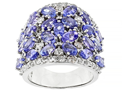 Photo of 4.50ctw Oval Tanzanite With 1.25ctw Round White Zircon Rhodium Over Sterling Silver Ring - Size 7