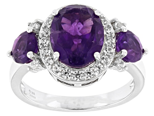 Photo of 2.65ctw African Amethyst With 0.20ctw Round White Zircon Rhodium Over Sterling Silver 3-Stone Ring - Size 9