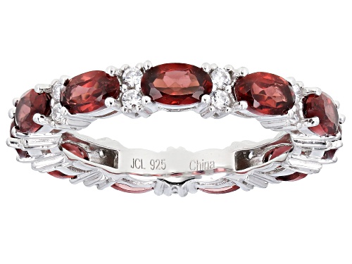 Photo of 3.93ctw Oval Red Garnet  With 0.38ctw Round White Zircon Rhodium Over Sterling Silver Band Ring - Size 8
