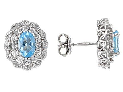 0.84ctw Swiss Blue Topaz With 0.54ctw Lab Created Sapphire Rhodium Over Sterling Silver Earrings