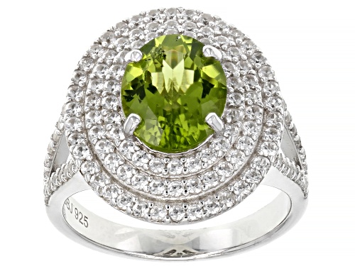 Photo of 2.25ct Oval Manchurian Peridot™ And 2.72ctw White Zircon Rhodium Over Sterling Silver Ring - Size 9