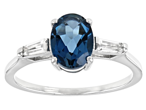 Photo of 1.32ct Oval London Blue Topaz With .17ctw Tapered Baguette White Topaz Rhodium Over Silver Ring - Size 9