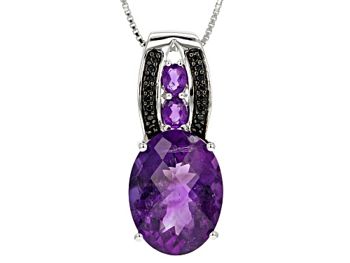 7.38ctw oval African amethyst with .06ctw round black spinel silver pendant with chain