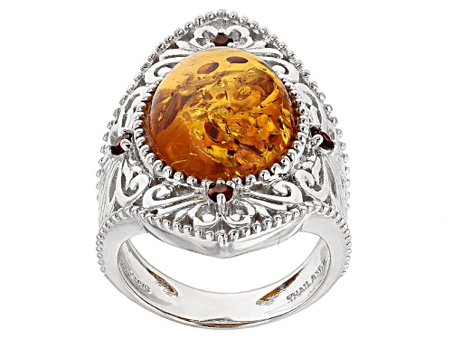 Photo of 15.5x12mm Oval Orange Amber And .17ctw Round Vermelho Garnet™ Rhodium Over Sterling Silver Ring - Size 5