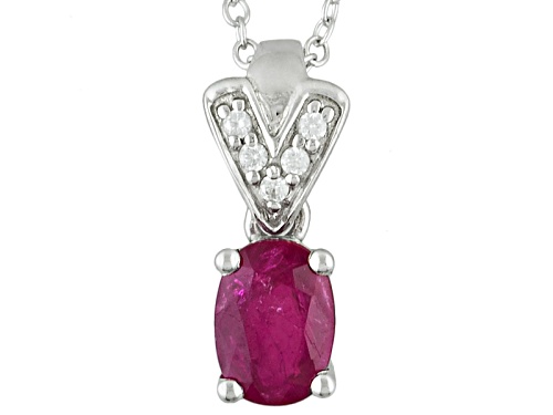 Photo of .80ct Oval Ruby And .05ctw Round White Zircon Sterling Silver Pendant With Chain