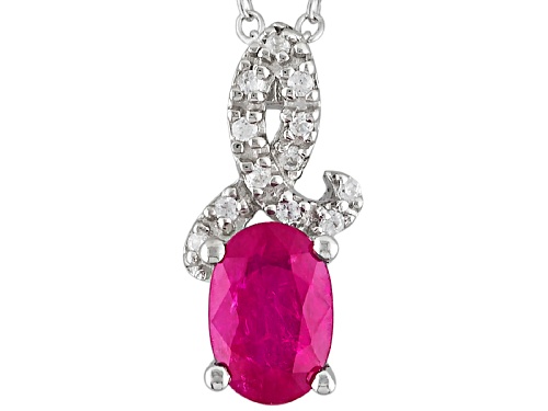 Photo of .85ct Oval Ruby And .11ctw Round White Zircon Sterling Silver Pendant With Chain