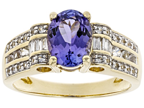 Photo of 1.19ct Oval Tanzanite With 0.19ctw Round Sapphire And 0.07ctw Baguette Diamond 10K Yellow Gold Ring - Size 7