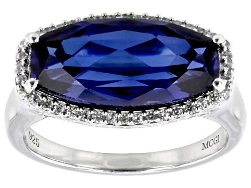 5.30ct Lab Created Sapphire with 0.21ctw White Zircon Rhodium Over Sterling Silver Ring - Size 6