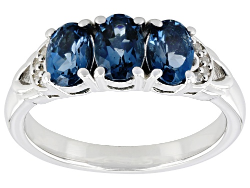 1.39ctw London Blue Topaz with 0.05ctw White Zircon Rhodium Over Sterling Silver Ring - Size 8
