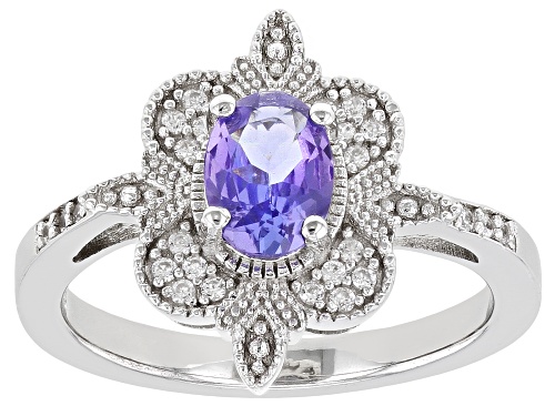 Photo of .64ct Oval Tanzanite With .11ctw Round White Zircon Rhodium Over Sterling Silver Ring - Size 8