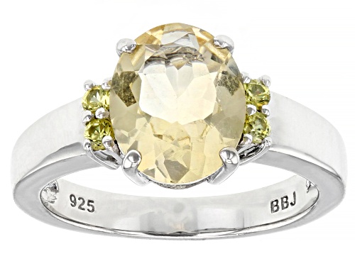 Photo of 1.96ct Oval Yellow Citrine With 0.16ctw Yellow Sapphire Rhodium Over Sterling Silver Ring - Size 8
