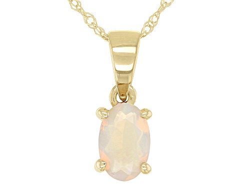 Photo of 0.20ct Oval Ethiopian Opal 10k Yellow Gold Pendant With Chain