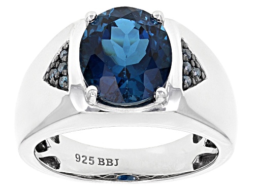 5.15ct Oval London Blue Topaz With .11ctw Round Blue Diamond Rhodium Over Sterling Silver Men's Ring - Size 12