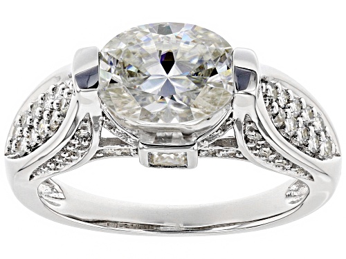 Photo of MOISSANITE FIRE® 2.82CTW DEW OVAL AND ROUND WITH PRINCESS CUT PLATINEVE™ RING - Size 10