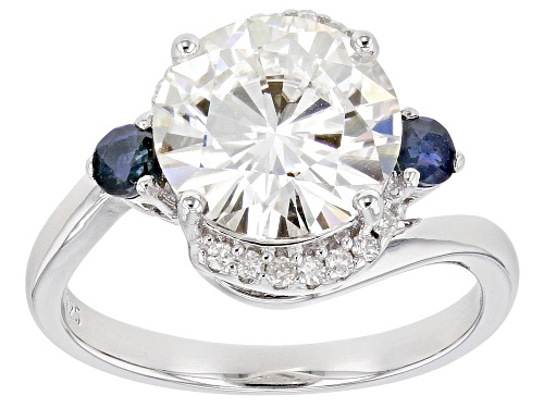 Photo of MOISSANITE FIRE(R) 3.74TW DEW ROUND AND .35CTW ROUND BLUE SAPPHIRE PLATINEVE(TM) RING - Size 11