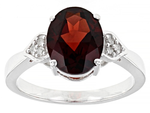 2.38ct Oval Vermelho Garnet™ with .05ctw Round White Diamond Accent Rhodium Over Silver Ring - Size 9
