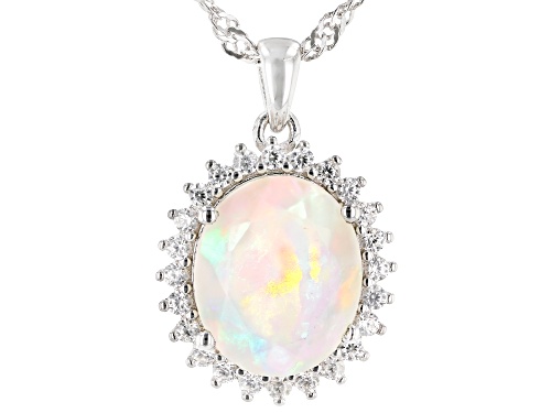 Photo of 2.04ct Oval Ethiopian Opal With .48ctw Zircon Rhodium Over Silver Halo Pendant With Chain