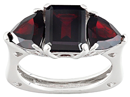 5.58ctw Emerald Cut And Trillion Vermelho Garnet™ Rhodium Over Sterling Silver 3-Stone Ring - Size 8