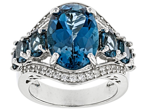 Photo of 6.80ctw Oval London Blue Topaz and .50ctw Round White Zircon Rhodium Over Sterling Silver Ring - Size 7
